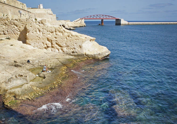 Many visitors don't realise you can access the sea at the foot of Valletta's fortifications. 