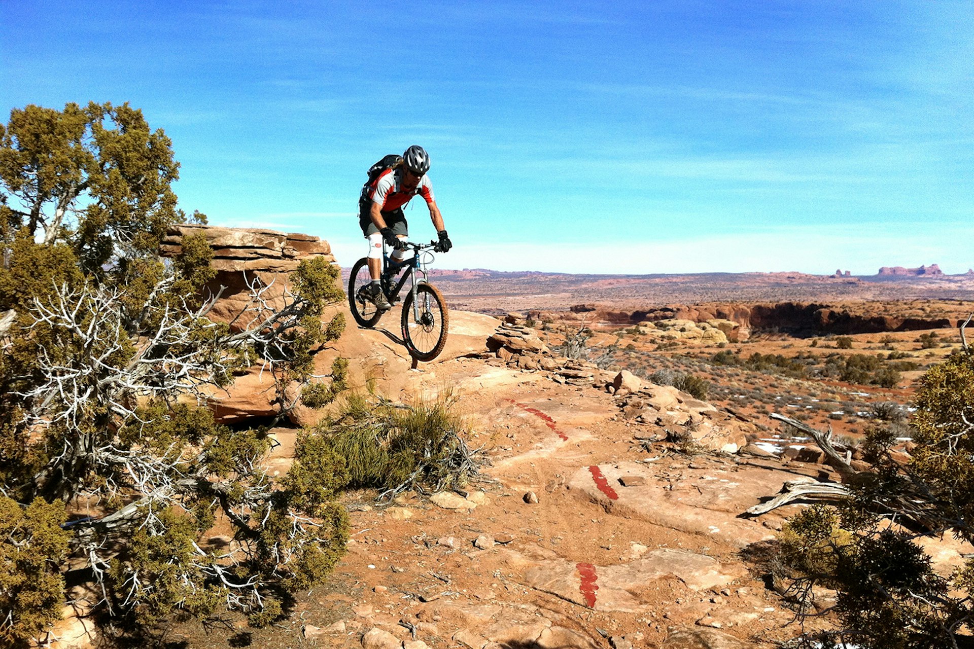 A mountain biker on the Moab Brand Trails in Utah. Image by TRAILSOURCE.COM / CC BY 2.0