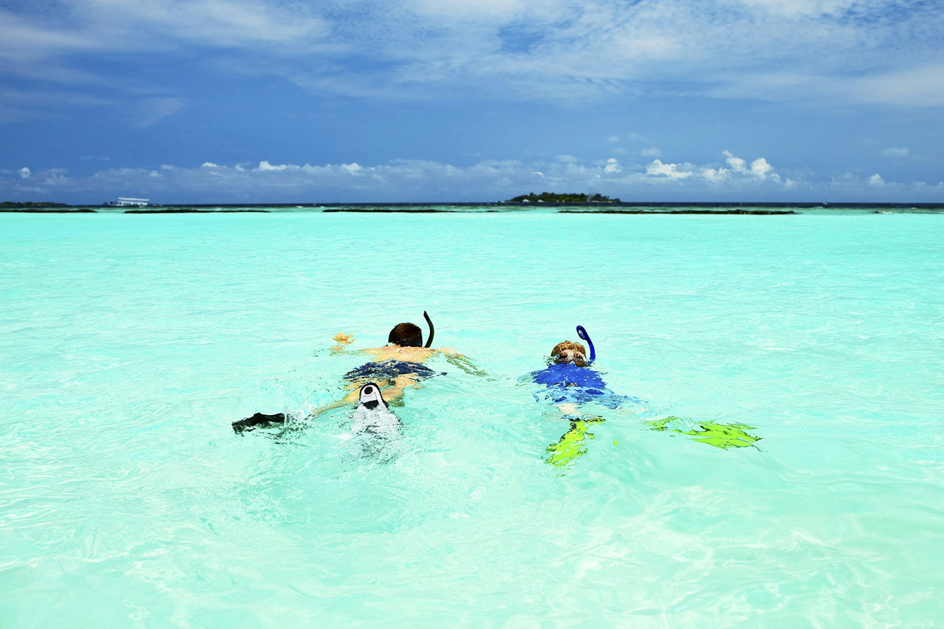 The Maldives might be synonymous with honeymoons, but it's great for the kids too. Image by WILLSIE / E+ / Getty Images