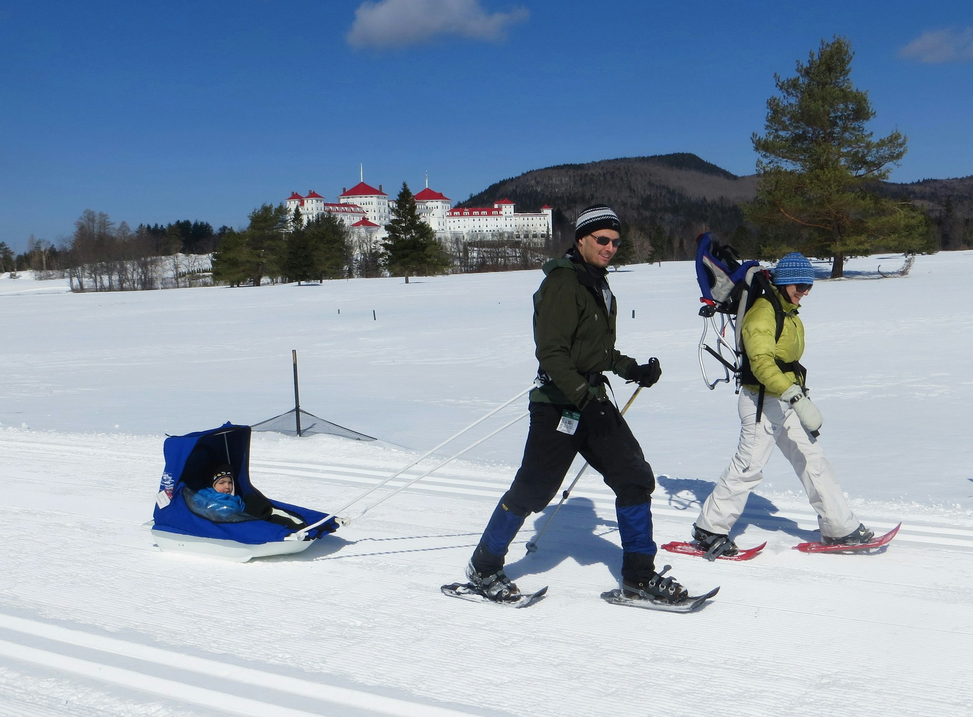 Snow-shoeing in front of the Omni Mount Washington Resort. Photo courtesy of The Mount Valley Washington Chamber of Commerce. 