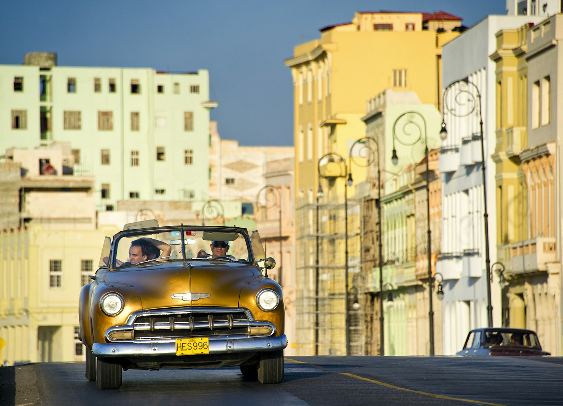 Features - Classic car cruising on the Malecon.