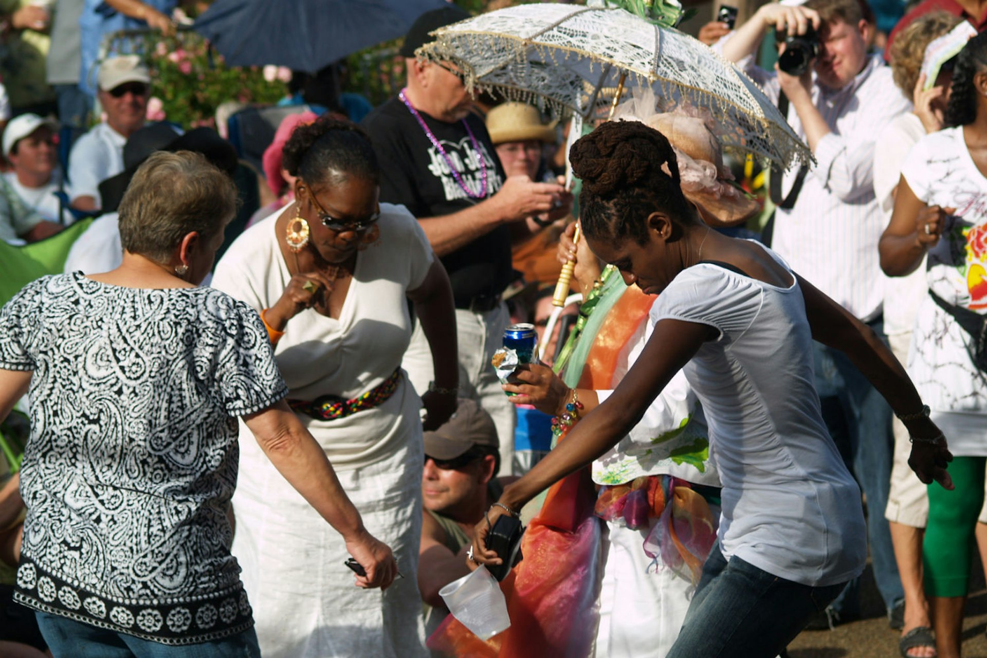 Dancing at a local Mardi Gras celebration in New Orleans. Image courtesy of New Orleans Convention and Visitors Bureau.
