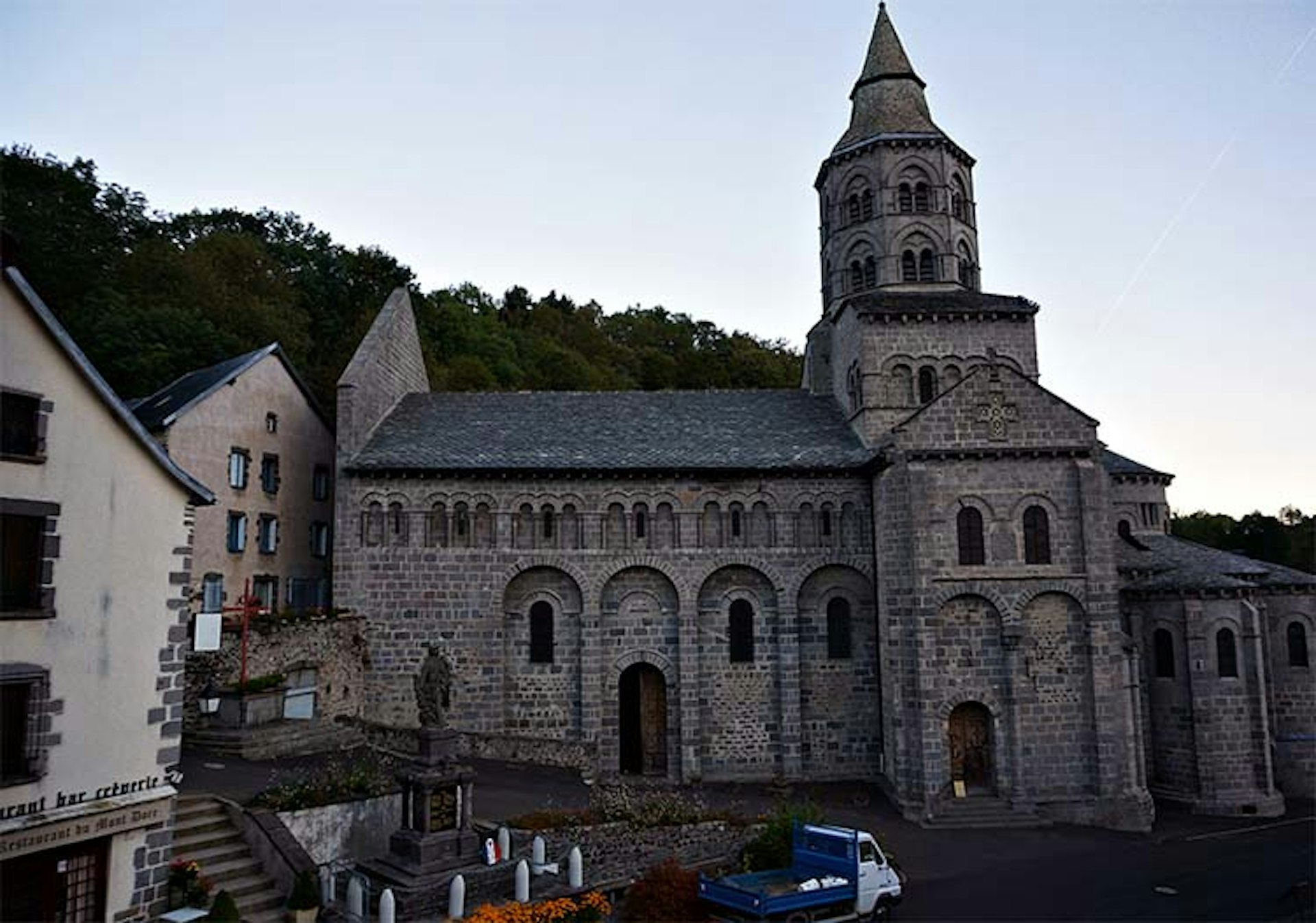 Notre-Dame d’Orcival, a Romanesque gem, is a magnet to pilgrims for an annual feast day, in an otherwise quiet spot in France's Auvergne. Image by Anita Isalska / Lonely Planet