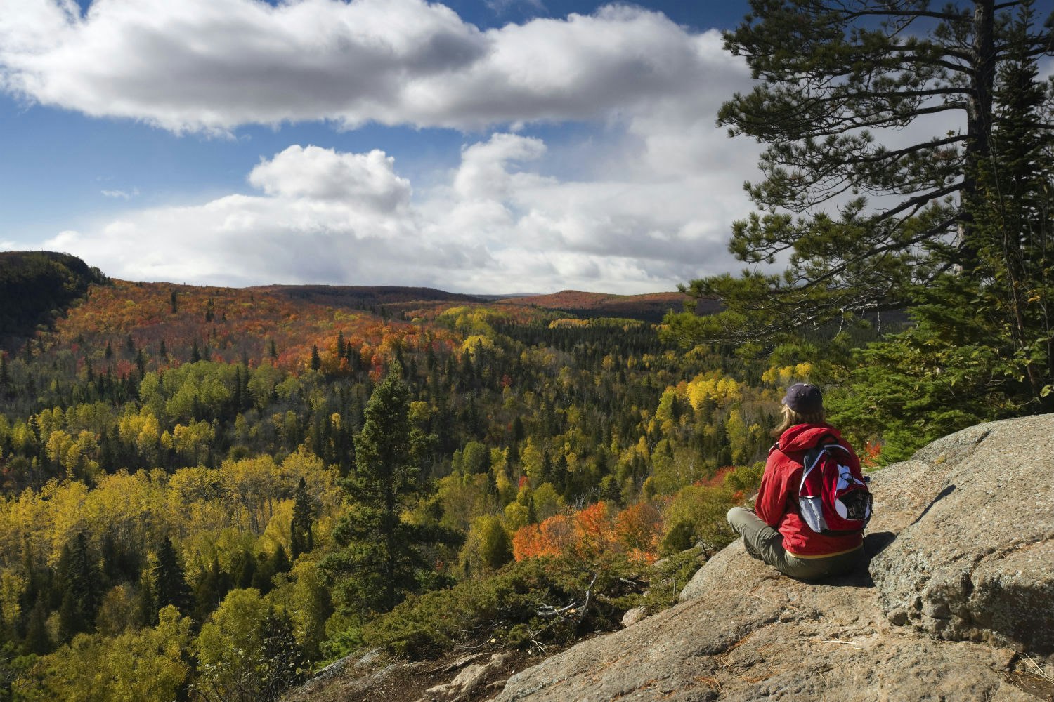 Taking in a scenic autumn view along the Superior Hiking Trail northeast of Duluth. Jim Kruger / E+ / Getty Images.