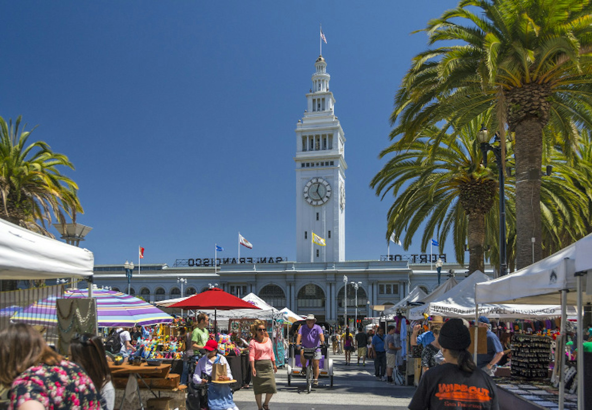 Treat yourself at the Ferry Building farmers market. Image by Izzet Keribar / Lonely Planet Images / Getty
