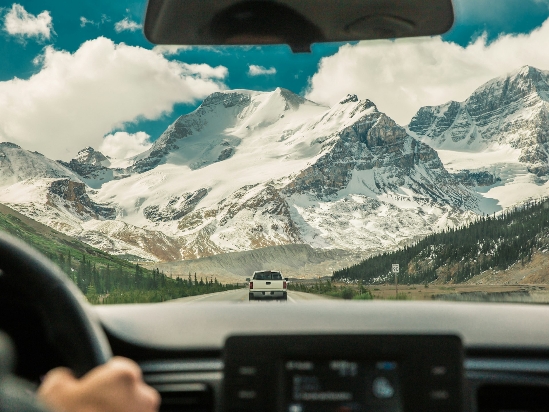 View form inside a car looking towards Jasper's snow-capped mountains © Sandra Mori / Shutterstock