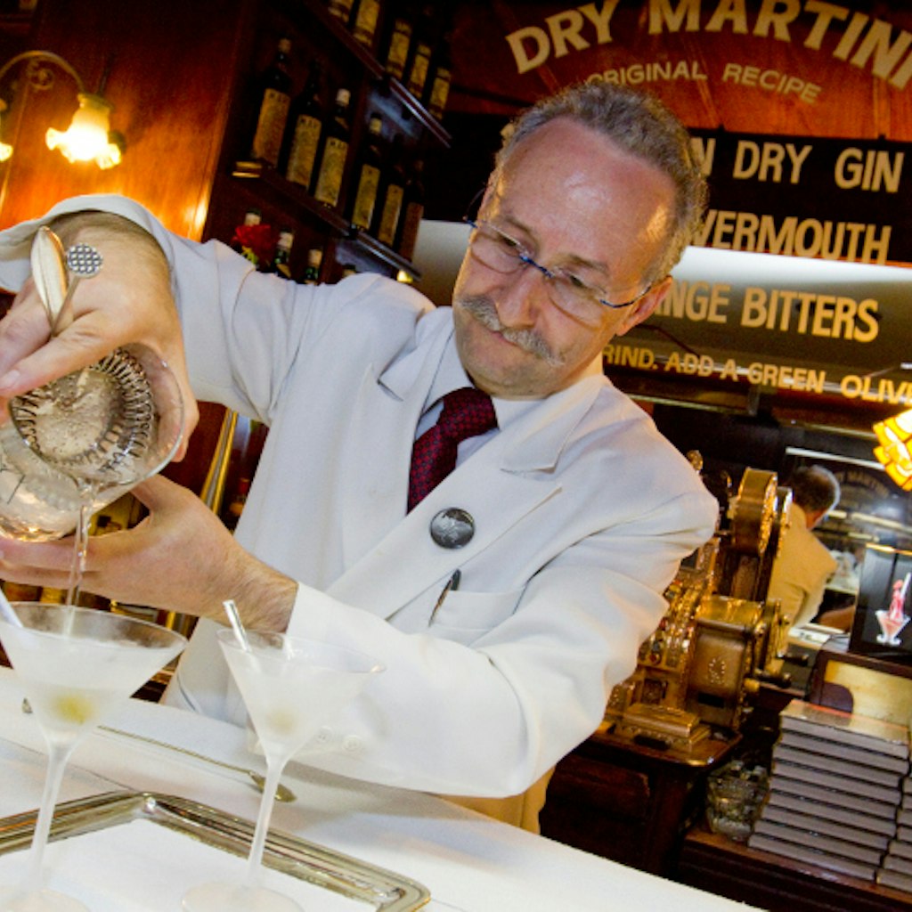 A bar-tender mixes Dry Martini's namesake cocktail. Image by Diego Lezama