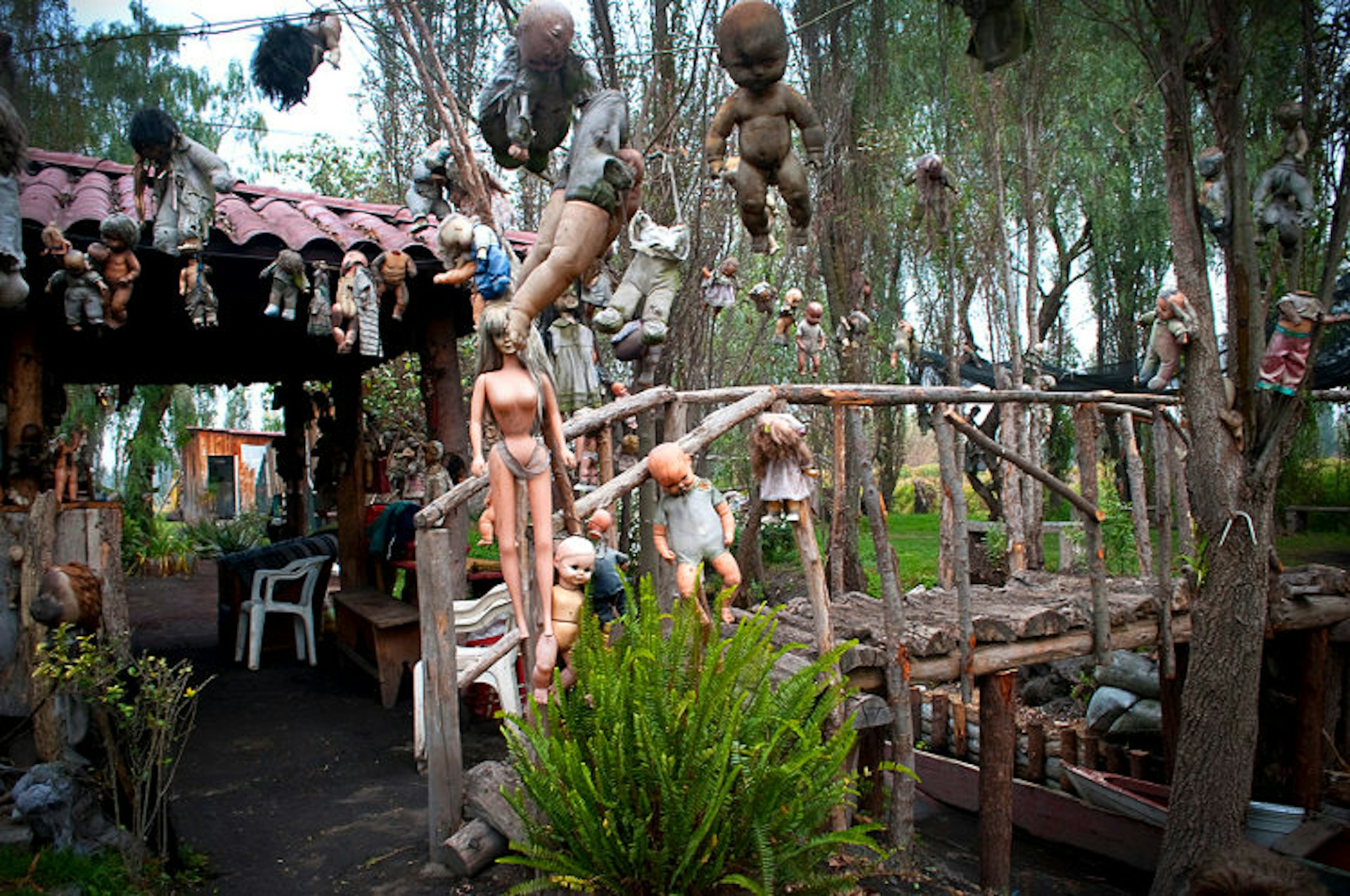 Creepy dolls welcome you to their island home. Image by John Hecht / Lonely Planet