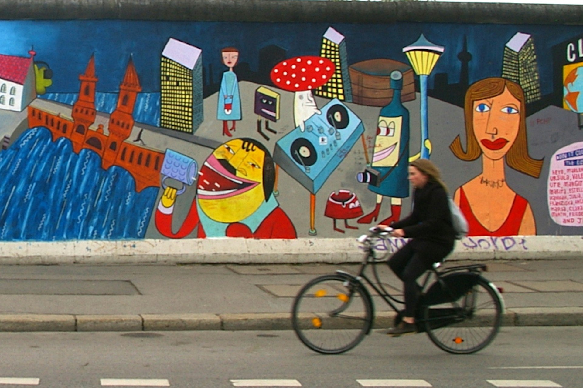 Some of the iconic artwork on the East Side Gallery. Image by Rae Allen / CC BY 2.0