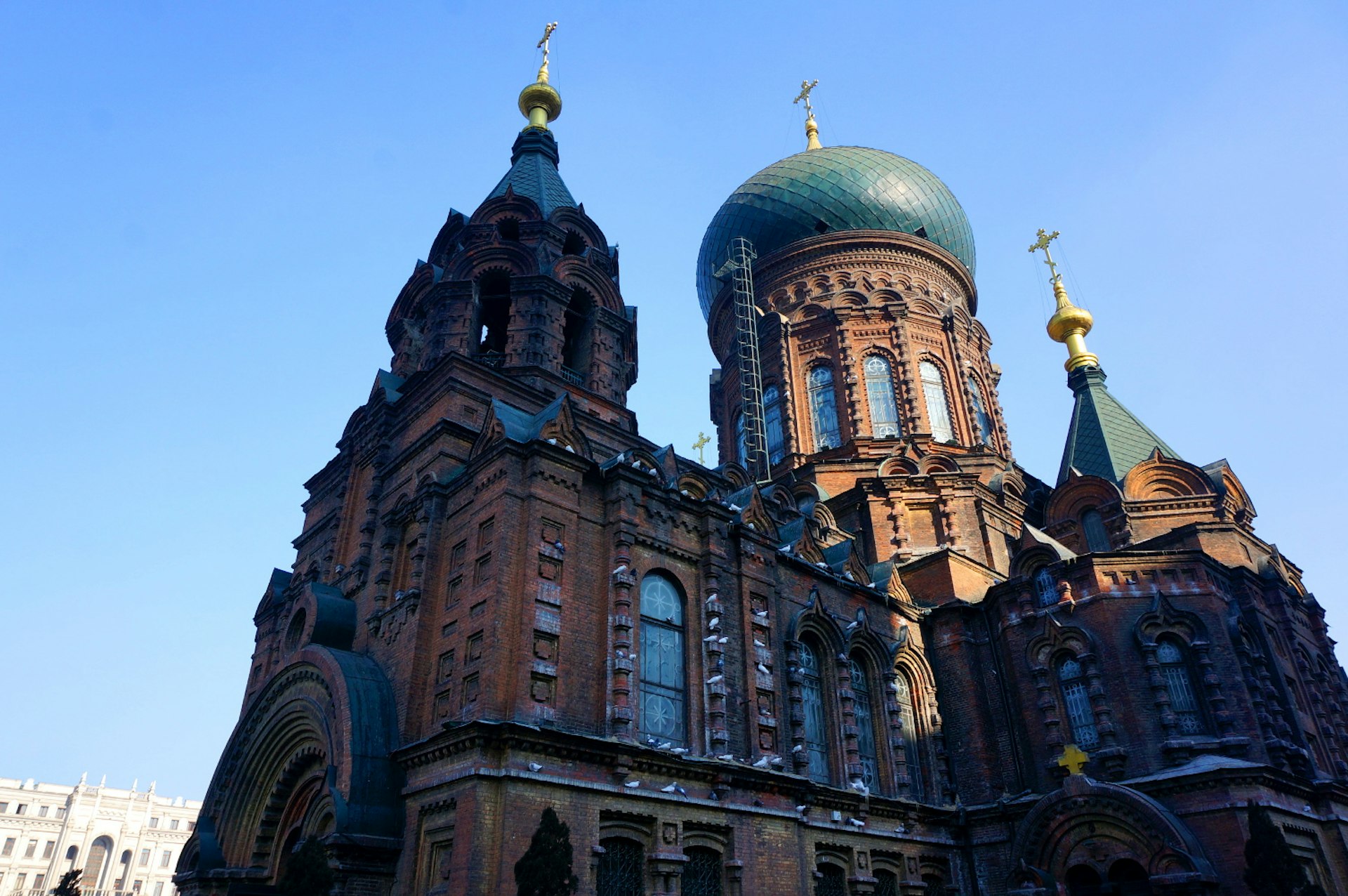 The Church of St Sophia's spires and bulbous green dome rise high into the skyline.