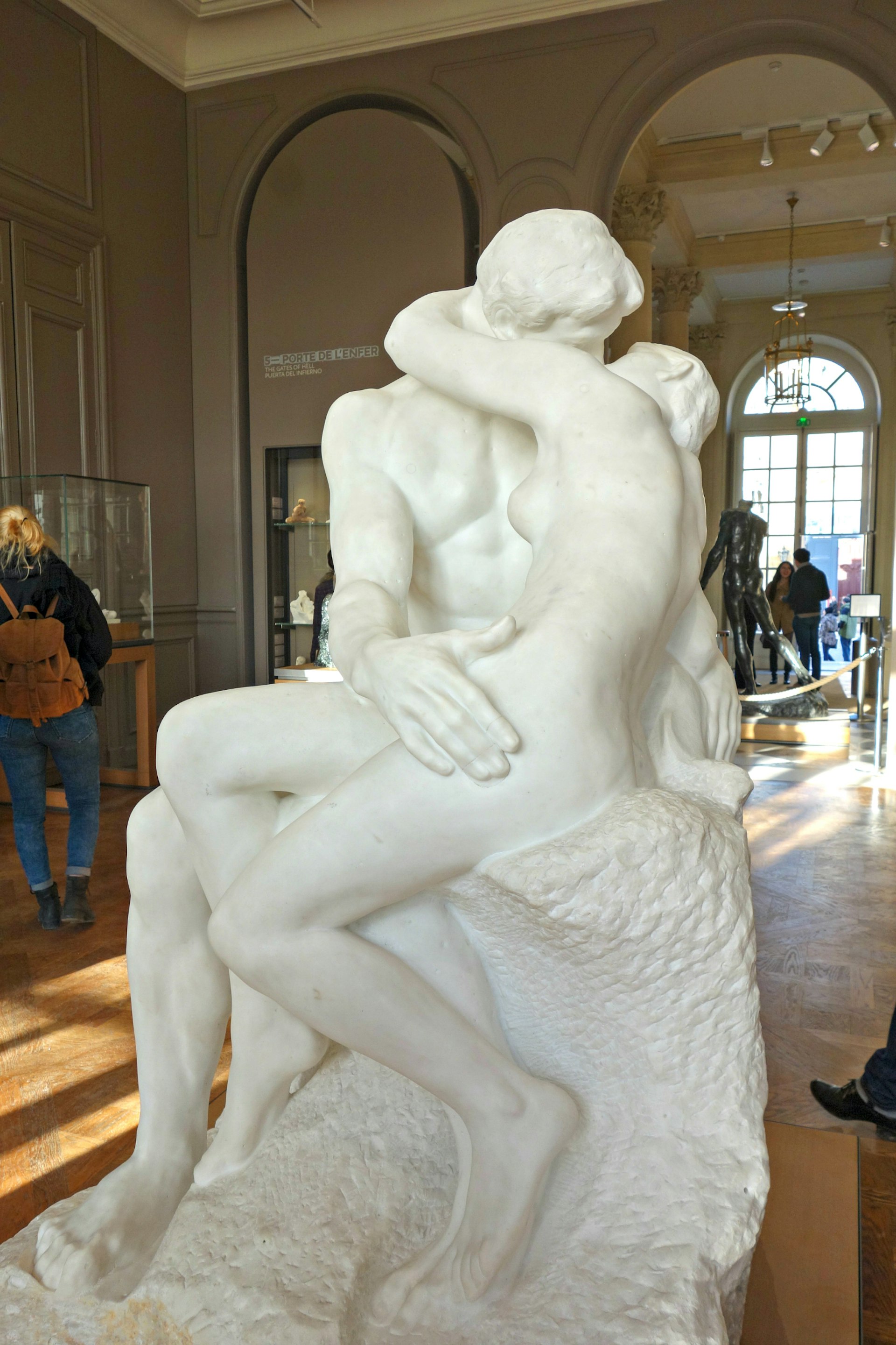 The Kiss sculpture by Rodin in the Rodin Museum, Paris. The sculpture portrays two people passionately kissing.