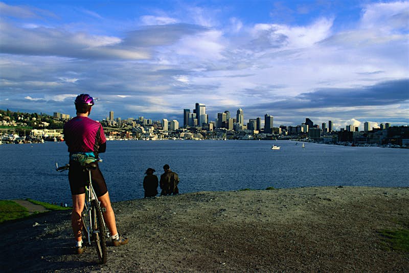 Features - 148692434_14_rs A cyclist takes a break to enjoy the view. Image by Ann Cecil / Getty