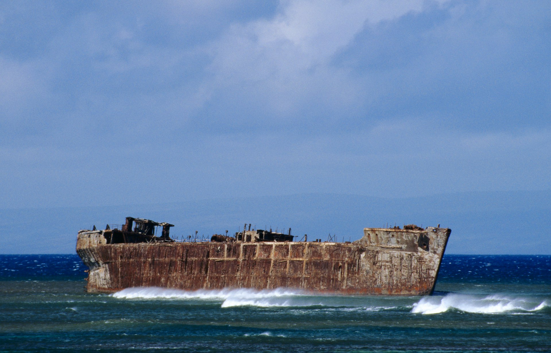 Due to its treacherous waters, the shore near Kalohi Channel has become known as Shipwreck Beach. Image by Ed Darack / Science Faction / Getty