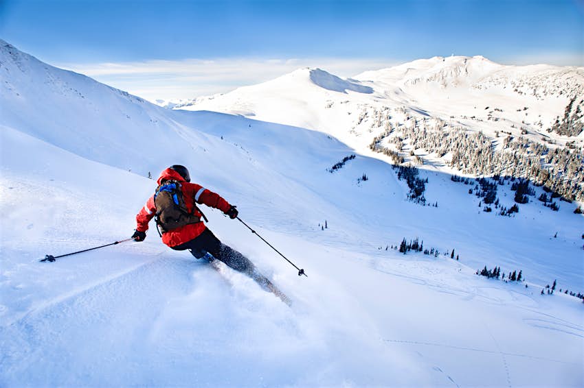 A skier descending a mountain near Whistler, BC. Image by Alan V. Young / Moment / Getty