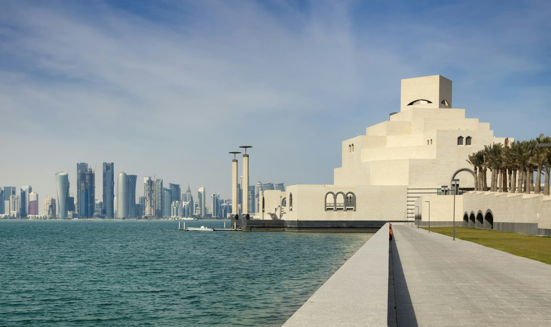The Museum of Islamic Art juts out into the Doha's bay. Image by Marcus Lindstram / E+ / Getty Images 