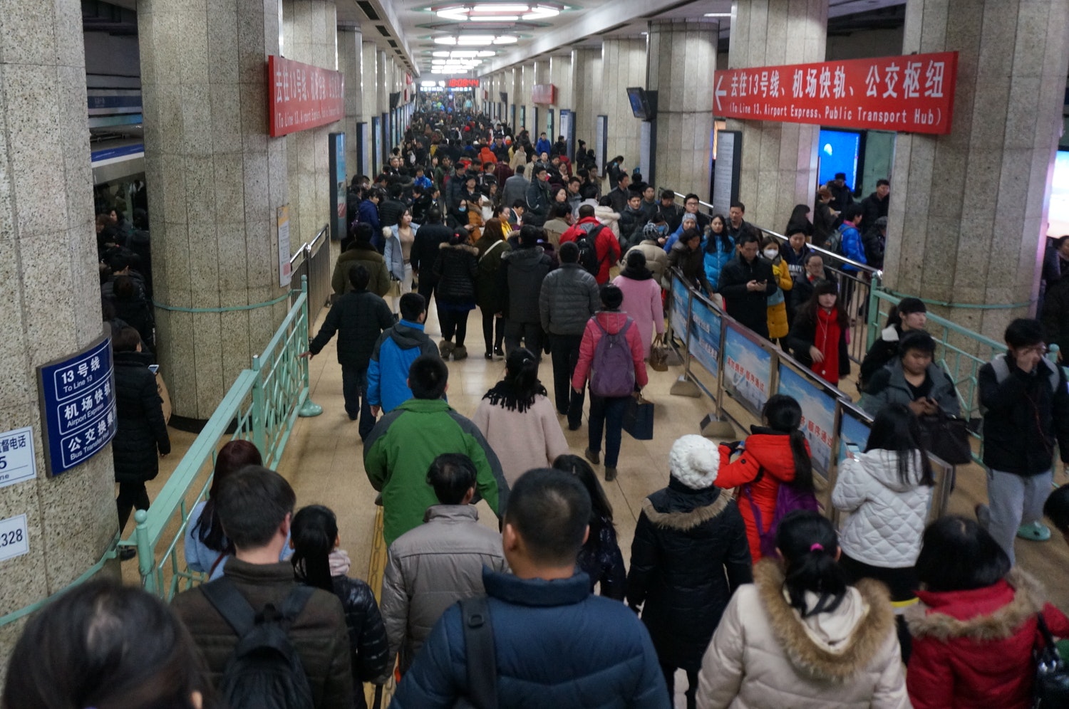 Crowded Beijing subway station. Image by Anita Isalska / Lonely Planet
