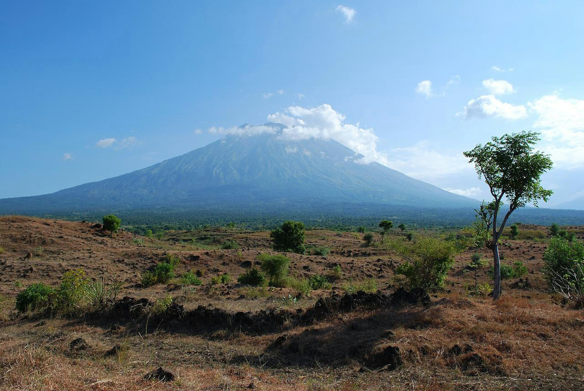 Bali's largest volcano, Gunung Agung, makes a striking silhouette. Image by Curtis Foreman / CC BY 2.0