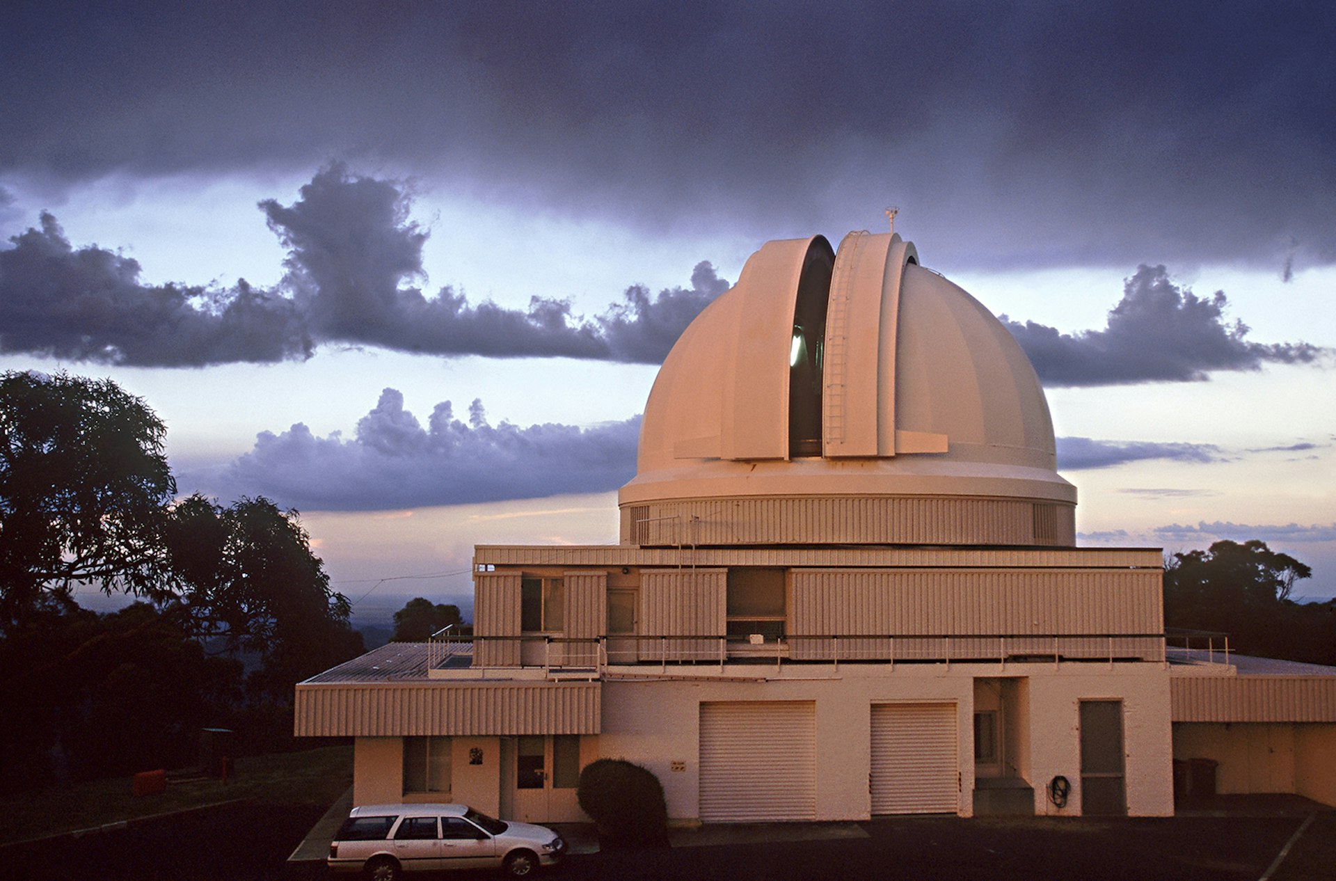 Sunset at Siding Spring Observatory, home to Australia's heftiest optical telescope, and a favourite dark-sky destination in NSW. Image by Grahame McConnell / Photolibrary / Getty Images
