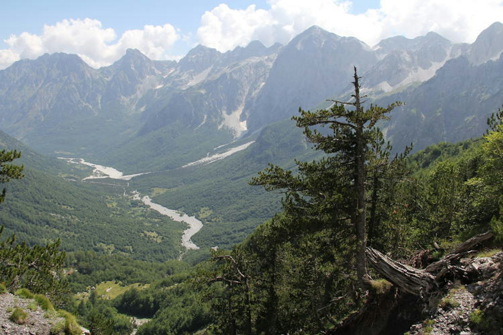 Looking back towards the Valbona River from the mountainside. Image by Tom Masters / Lonely Planet