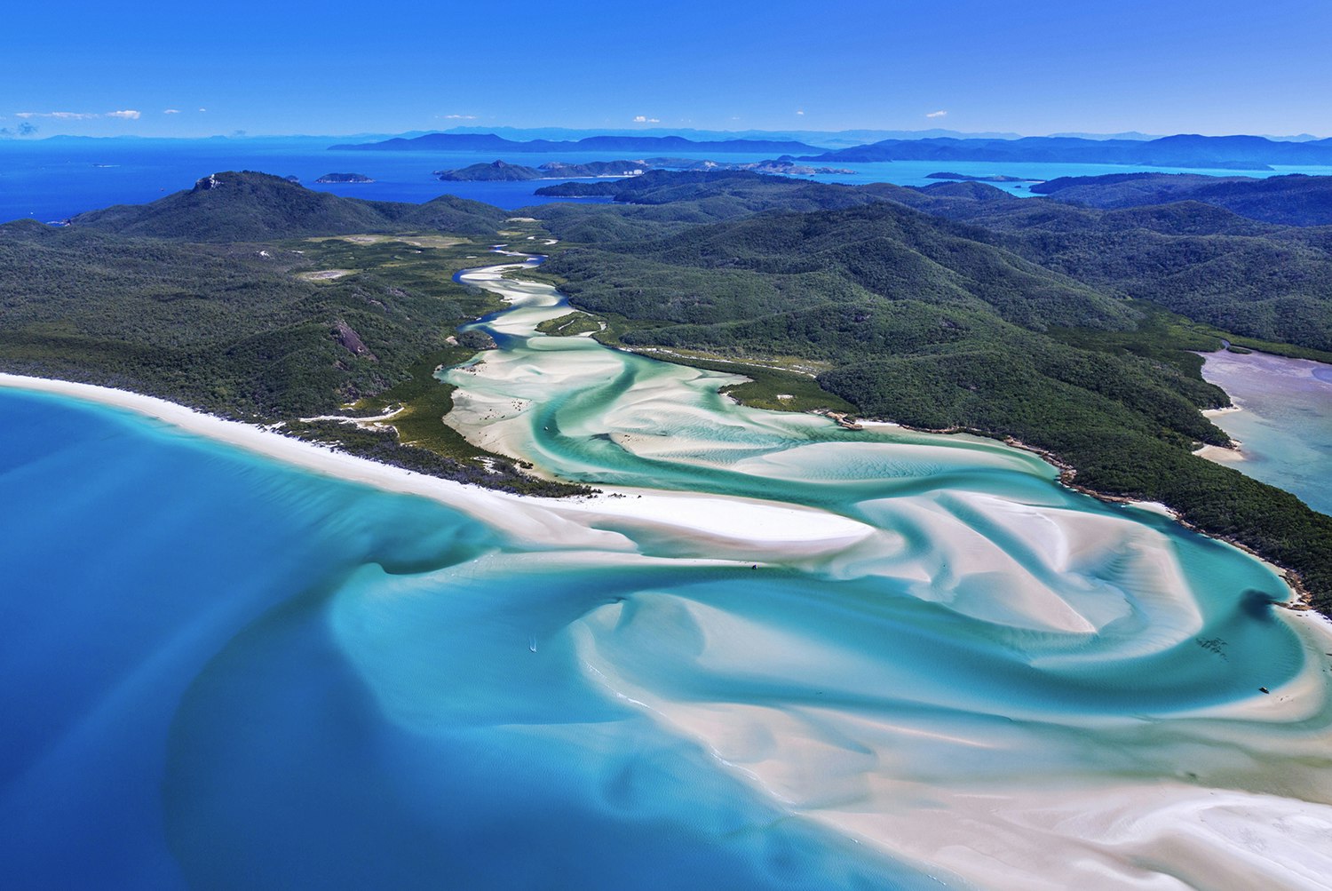 Paradise found: an aerial view over Whitehaven Beach in Queenland's Whitsunday Islands. Image by Yoshio Tomii / Getty Images