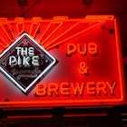The neon sign at The Pike Pub and Brewery. Image by Brendan Sainsbury / Lonely Planet