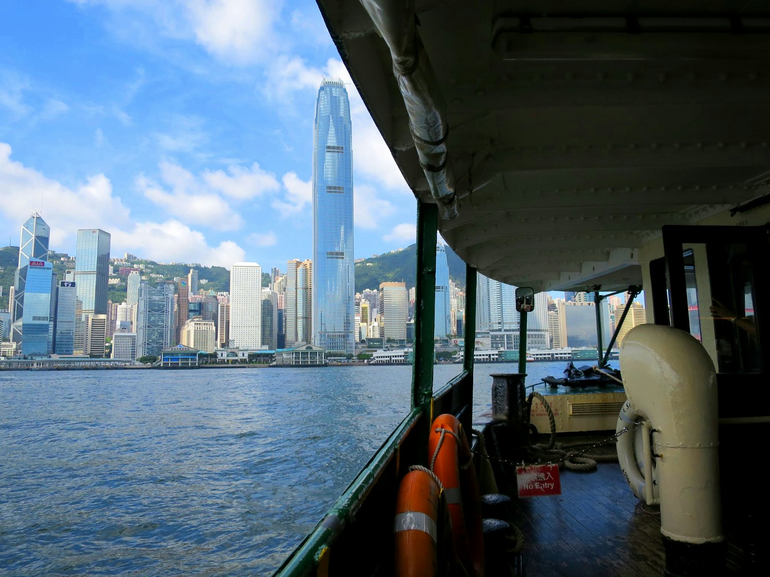 Skyscrapers tower above during a Star Ferry ride. Image by Megan Eaves / Lonely Planet