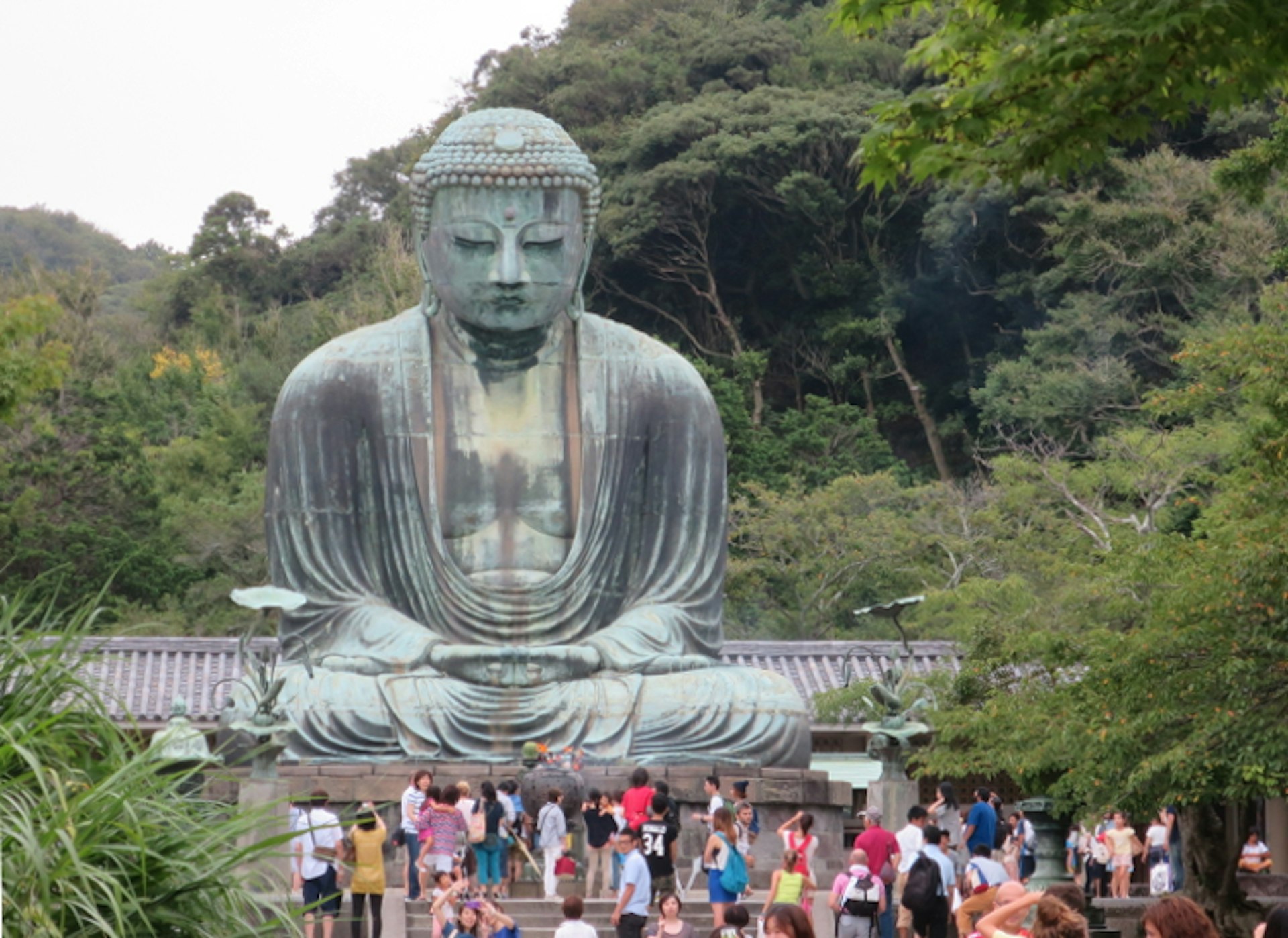 The bronze statue of Amida Buddha at Kōtoku-in temple, Kamakura. Image by Matt Phillips / Lonely Planet