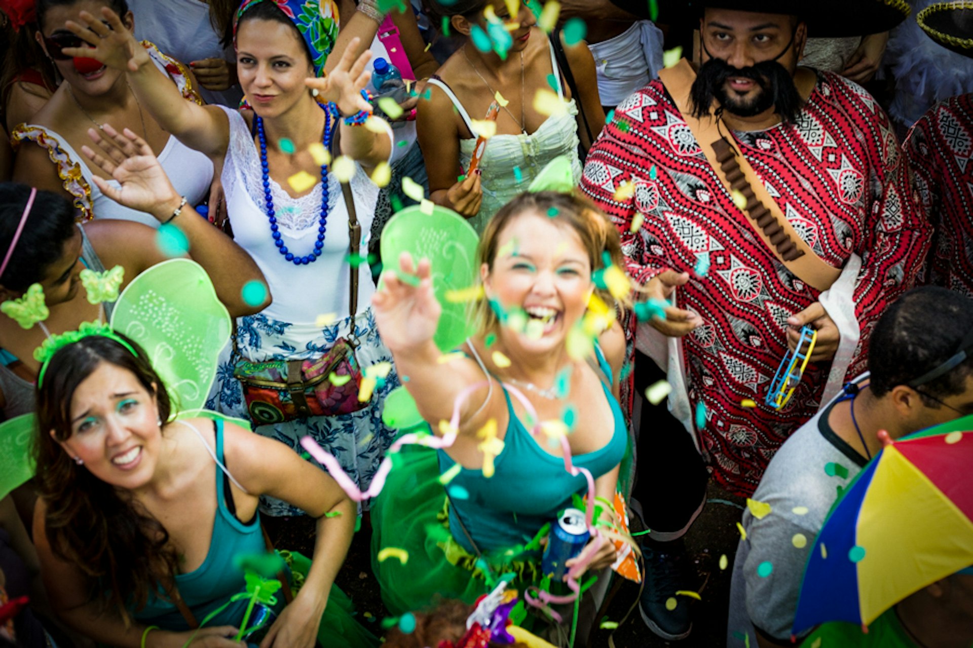 Revelers get into the carnival atmosphere. Image by Teresa Geer / Lonely Planet