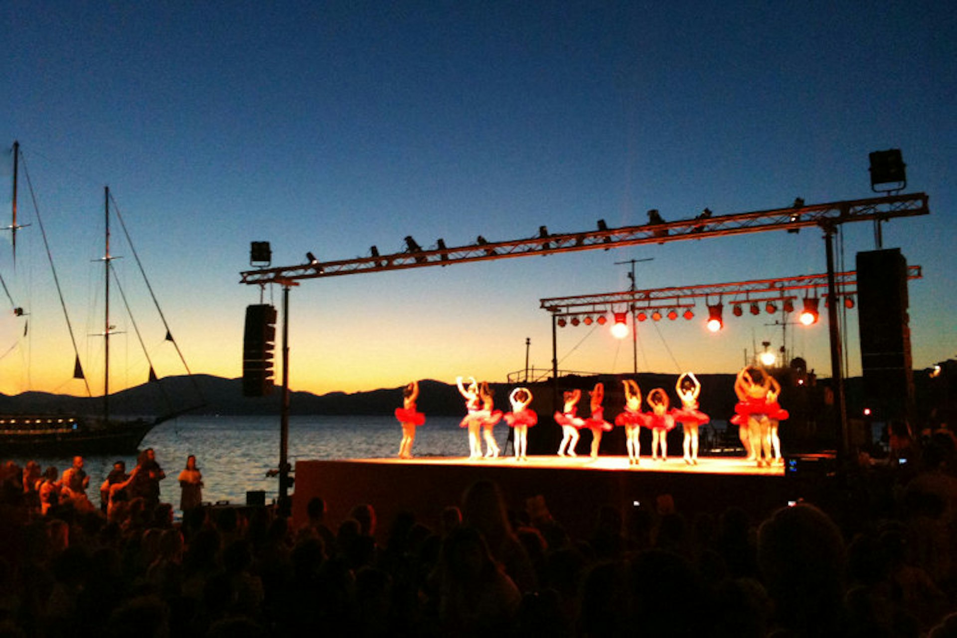 The town turns out for a children’s harbourside ballet performance in Hydra. Image by Alexis Averbuck / Lonely Planet