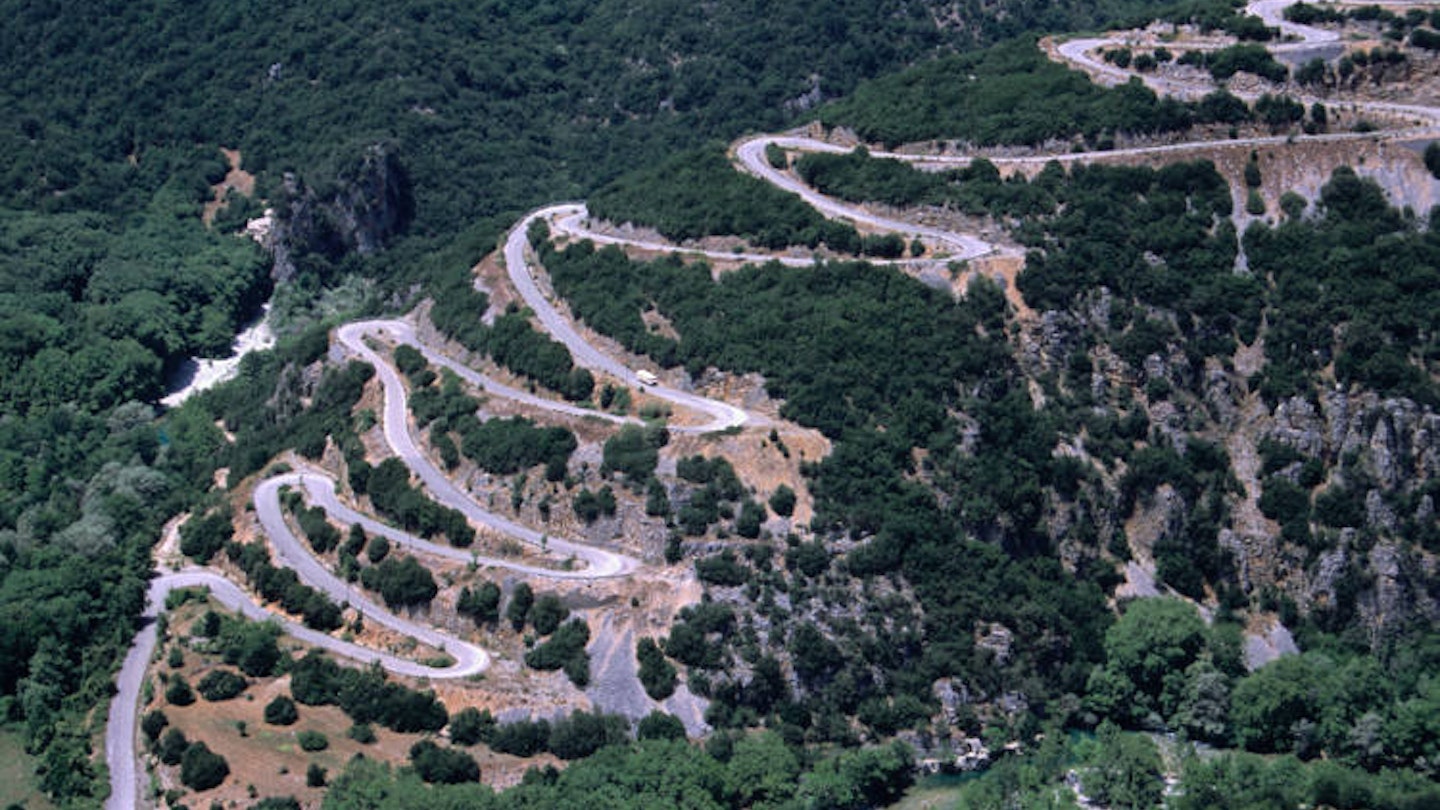 Winding road through the Pindos Mountains, northern Greece. Image by Mark Daffey / Getty Images