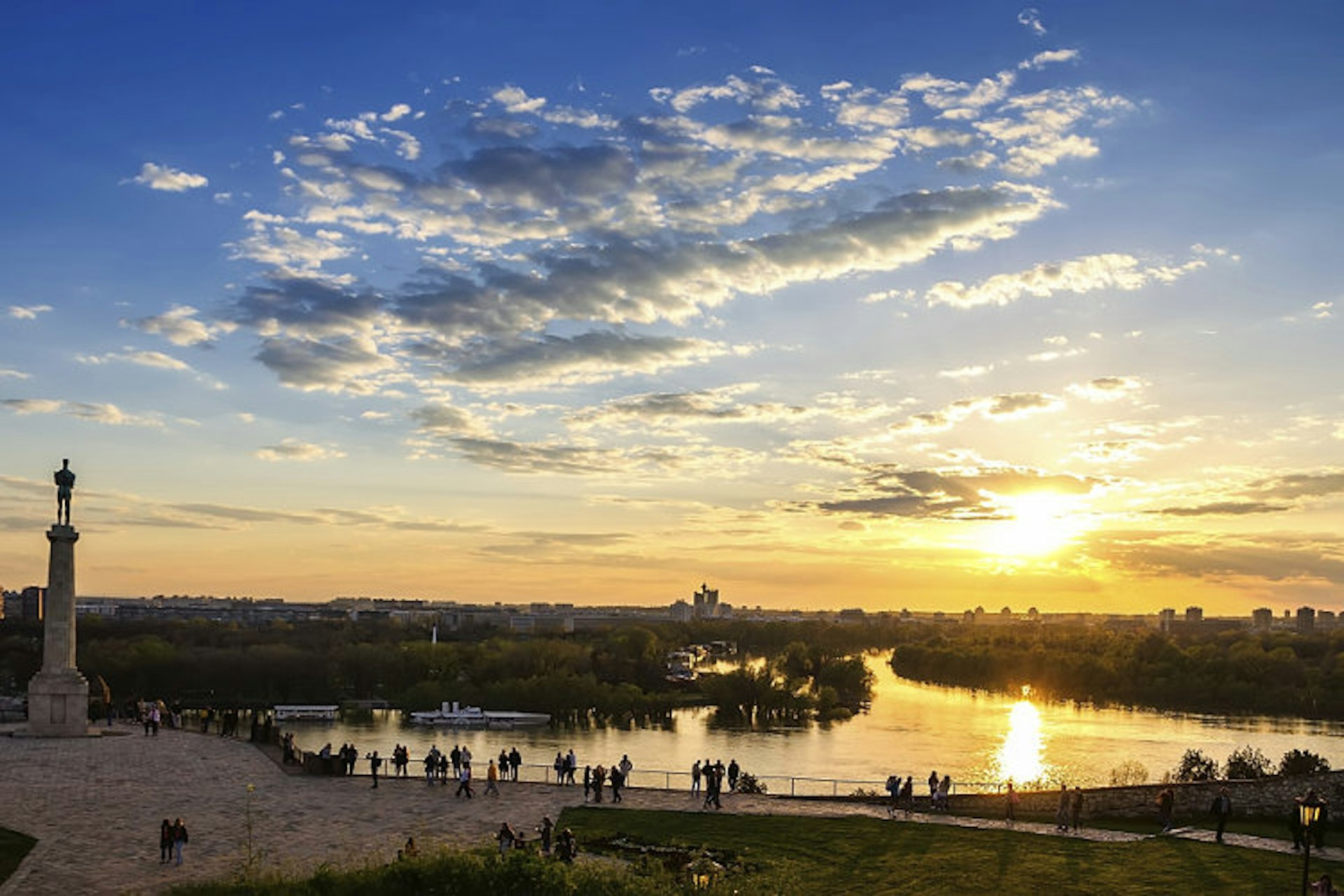 Sunset views from Kalemegdan over the confluence of the Sava and the Danube. Image by Djordje Rusic / Getty Images