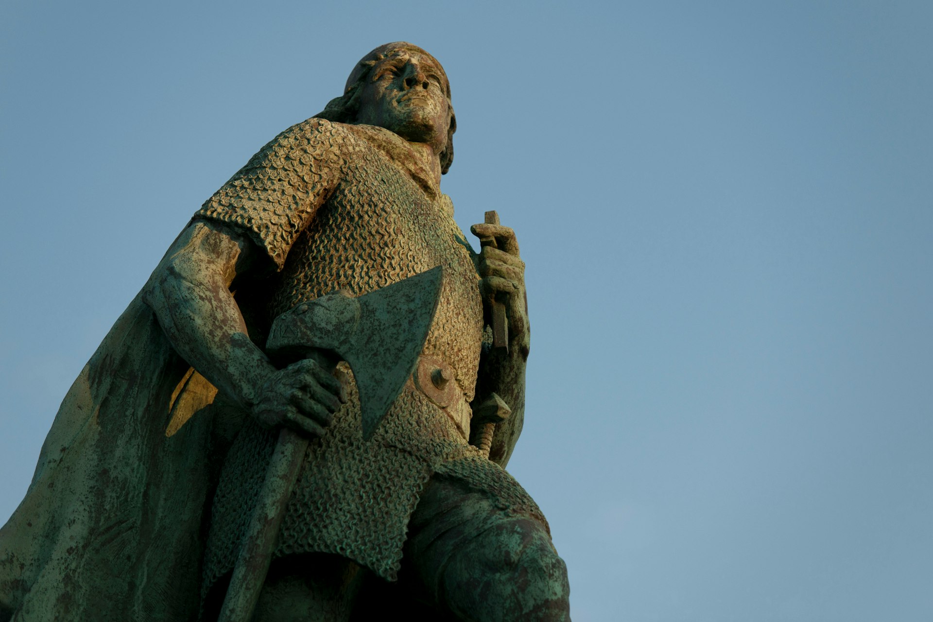 Leifur Eiríksson's statue stands tall outside Reykjavík's Hallgrímskirkja church. Image by Keith Levit Photography / Photolibrary / Getty