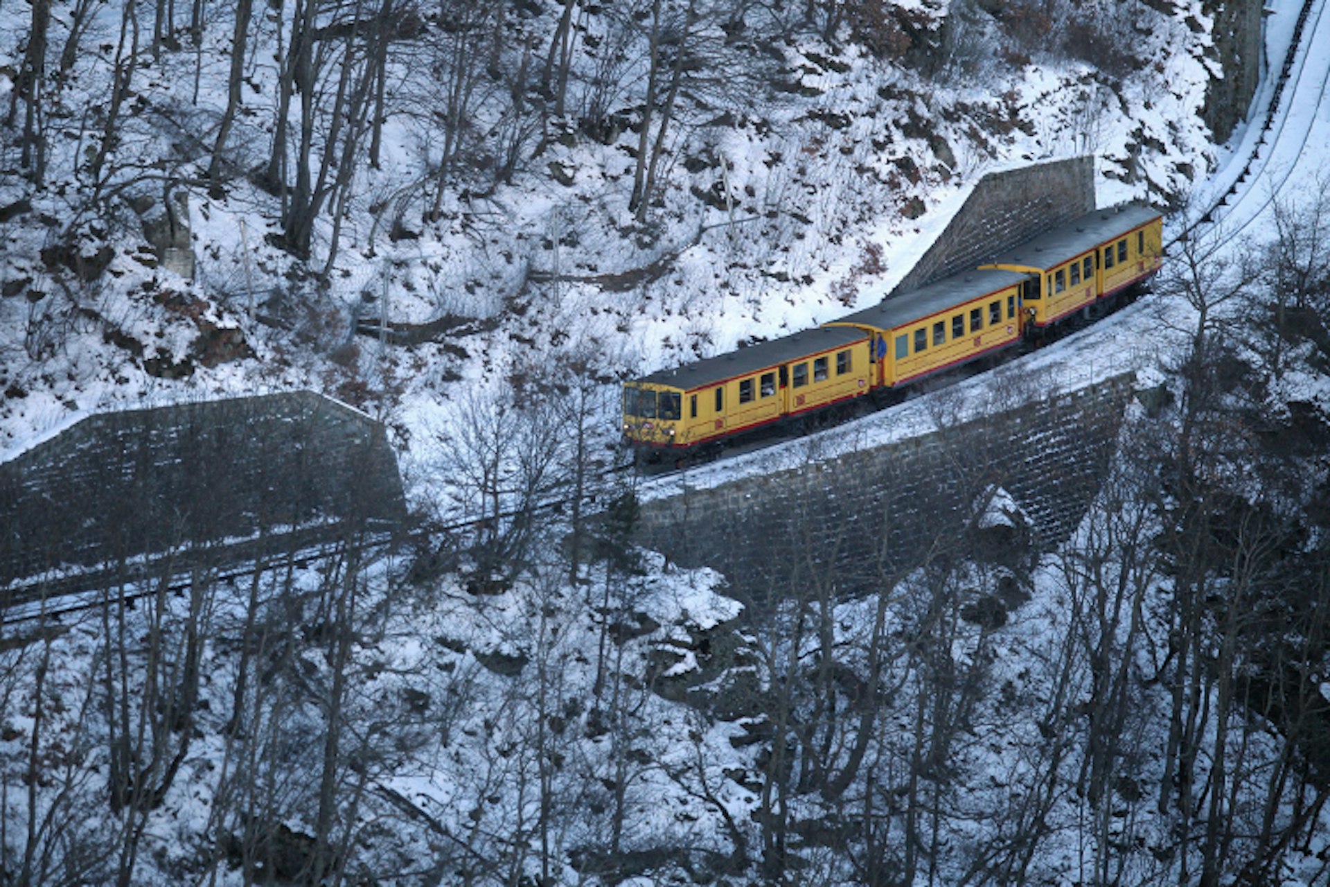 Journey through the French Pyrenees on Le Train Jaune (AKA The Canary). Image by Raymond Roig/Photostock Getty.