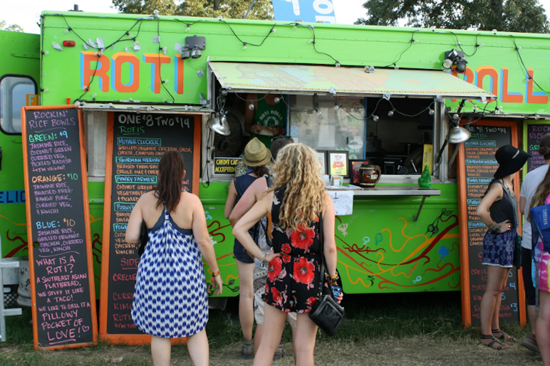 Food trucks are an easy, though not always cheap, way to fill up at festivals. Image by Alexander Howard/Lonely Planet
