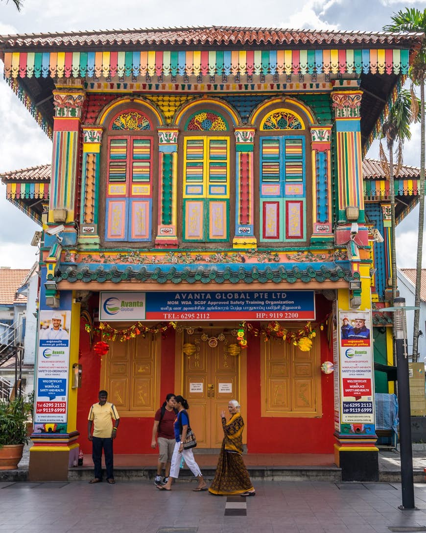 A brightly painted, multicoloured building in Little India, Singapore © Alex Cimbal / Shutterstock