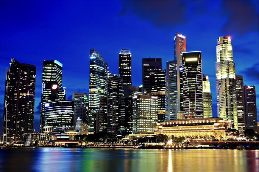 Nighttime view of Singapore's multiple skyscrapers © ESB Professional / Shutterstock