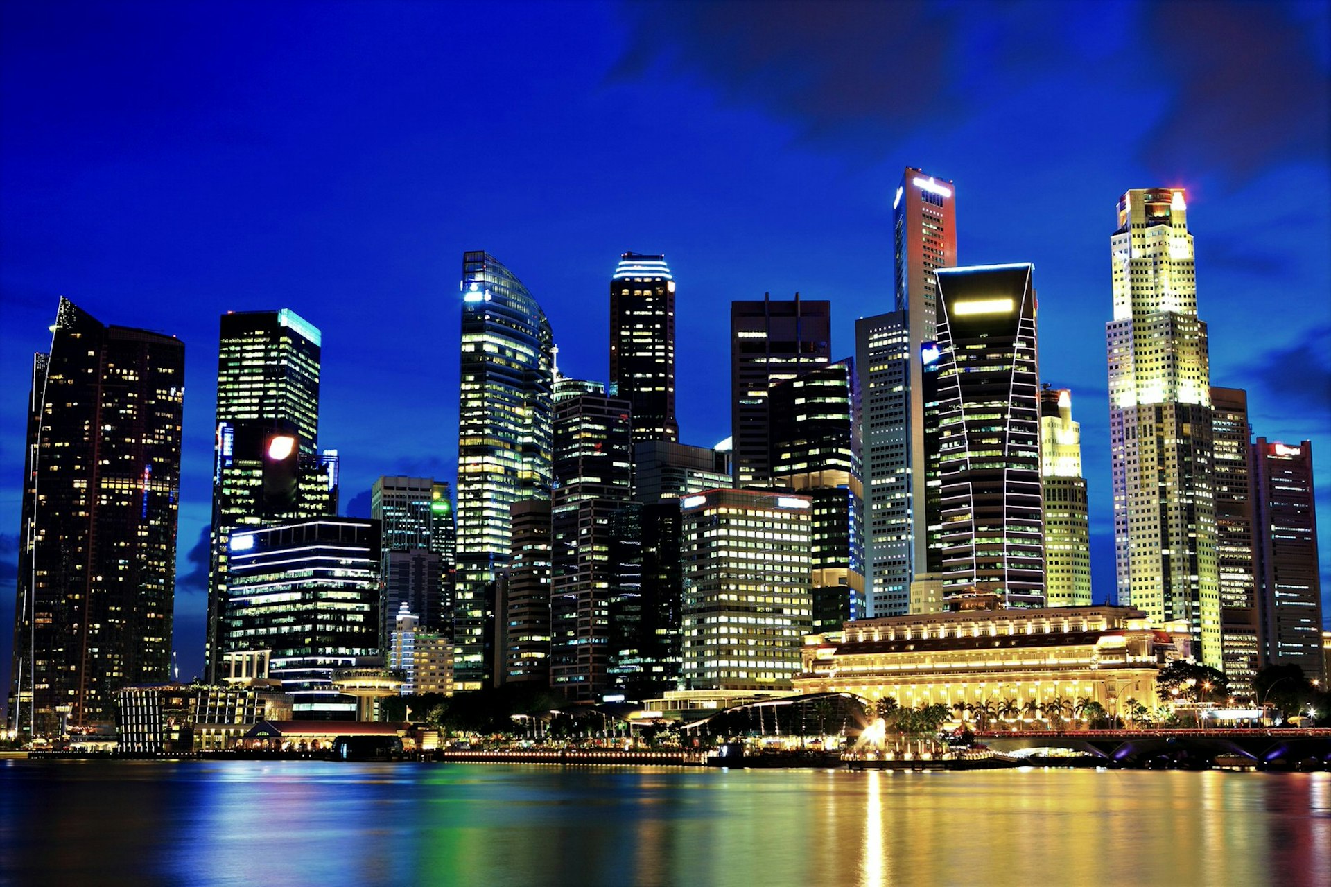 Nighttime view of Singapore's multiple skyscrapers © ESB Professional / Shutterstock