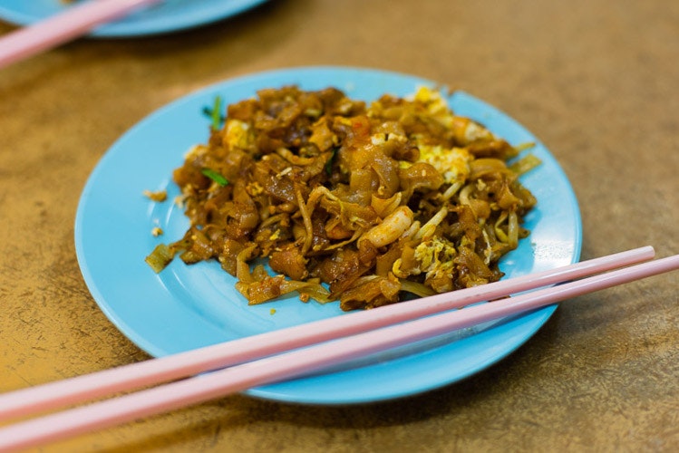 Char kway teow as served at a street stall in George Town. Image by Lonely Planet