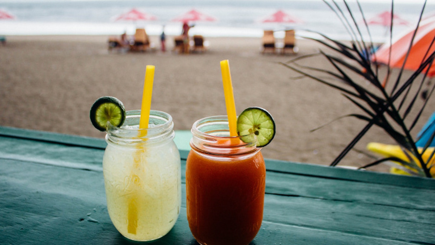 Cocktails on the beach, Seminyak, Bali. Image by Andreia CC BY 2.0