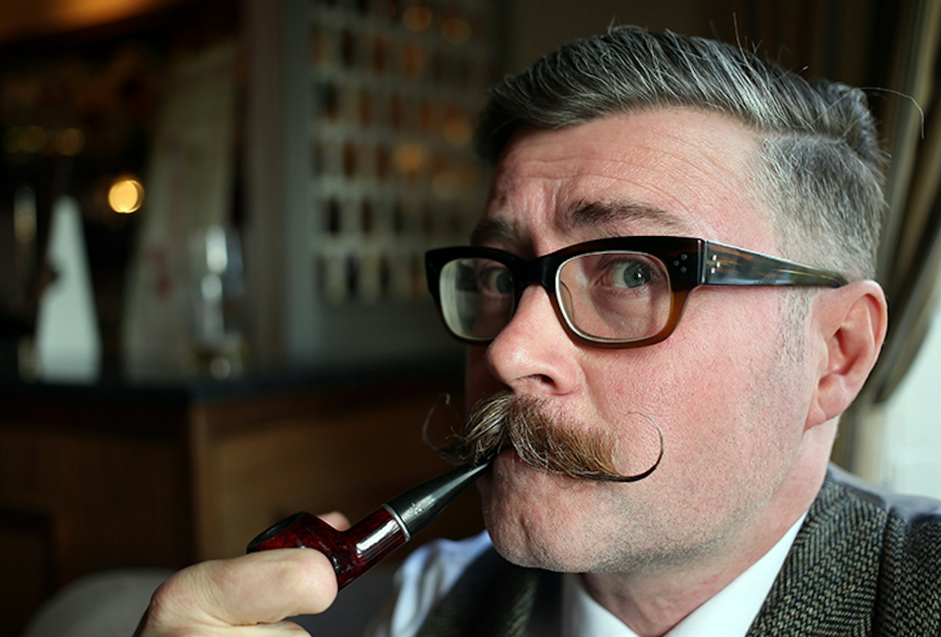 A moustache enthusiast at a meeting of the Handlebar Club.