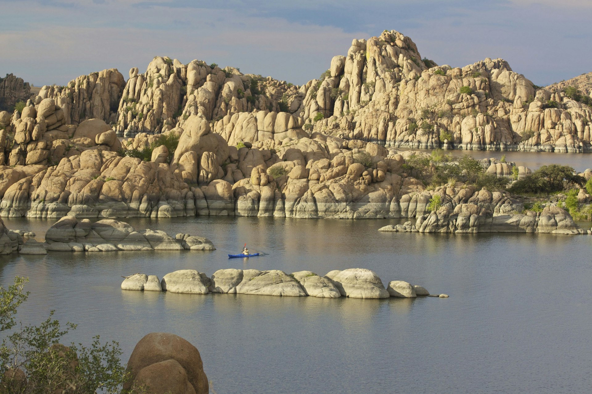Explore 380 acres of calm water surrounded by Watson Lake’s granite-boulder shores. Image by equigini / Getty