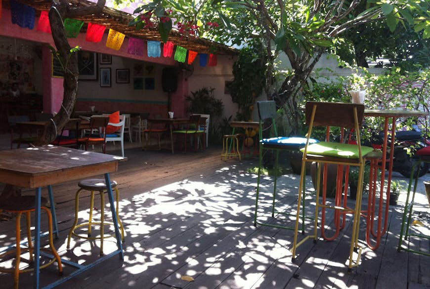 Knock back tacos and tequila in Lacalaca's pretty shaded courtyard. Image by Kate Morgan Lonely Planet