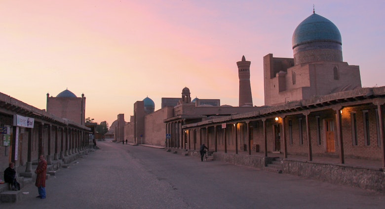 Bucket list view: sunset at Bukhara Kalon Minaret in Uzbekistan. Image by Stephen Lioy / Lonely Planet