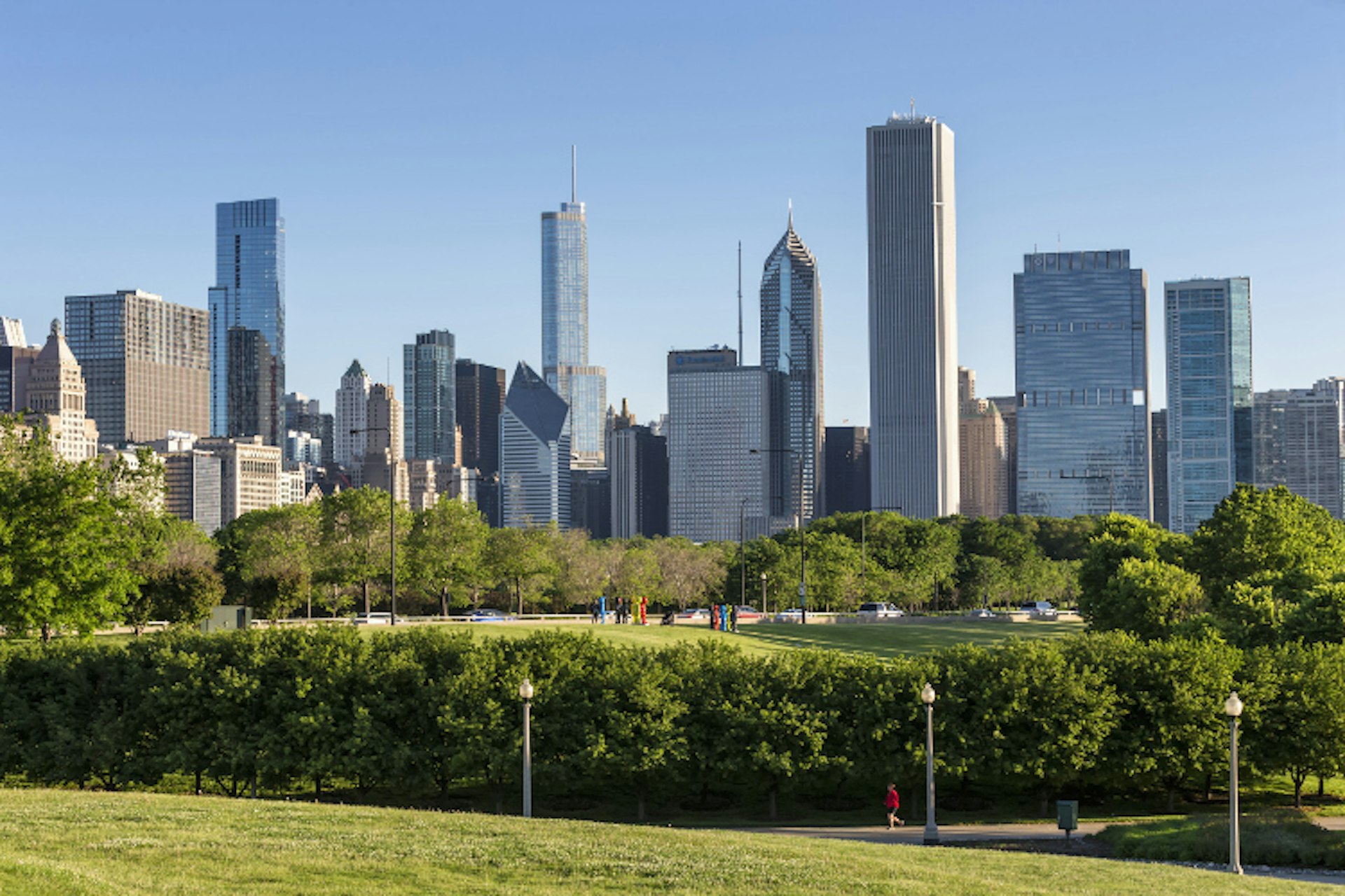 Millennium Park surrounded by the giants of Chicago's skyline. Image by Westend61 / Getty Images
