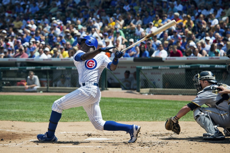 Cheer on the Cubs at Wrigley Field. Image by Alfonso Soriano / CC BY-SA 2.0