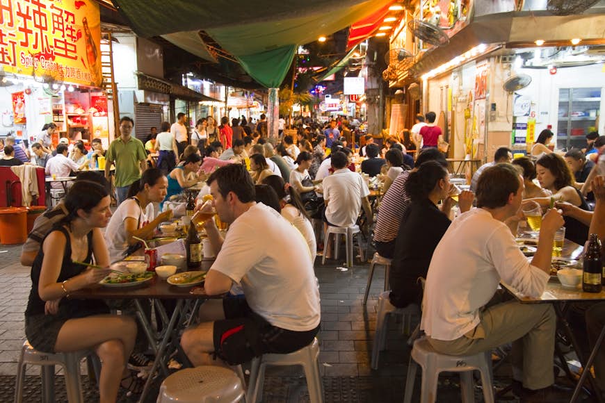 Eating out: night markets and late cafes are Kowloon's specialty. Images by Kylie McLaughlin / Getty