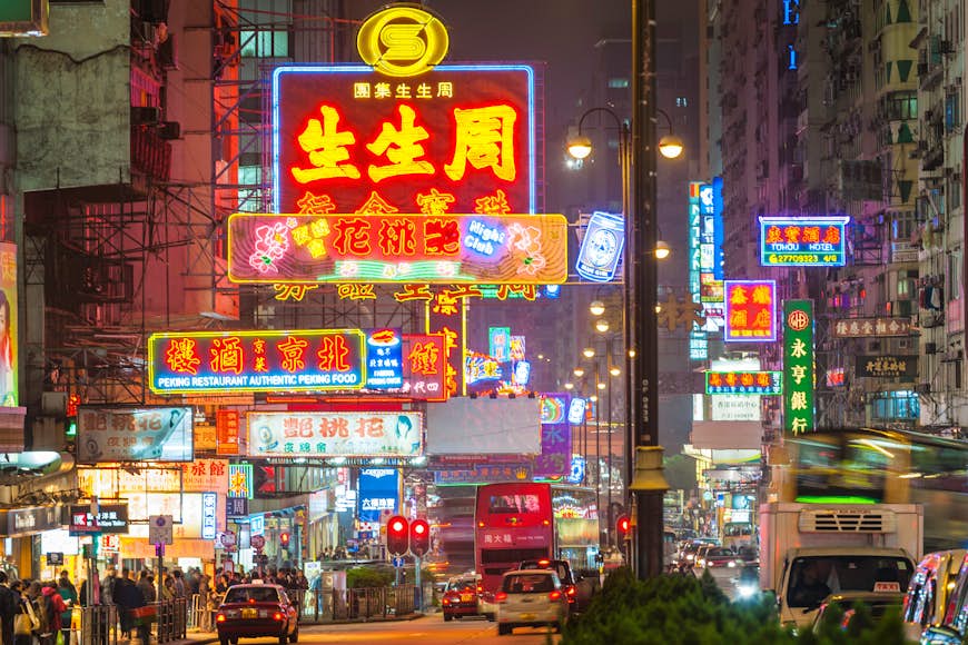 Neon-lit Nathan Road: the bustling heart of Kowloon. Image by fotoVoyager / Getty
