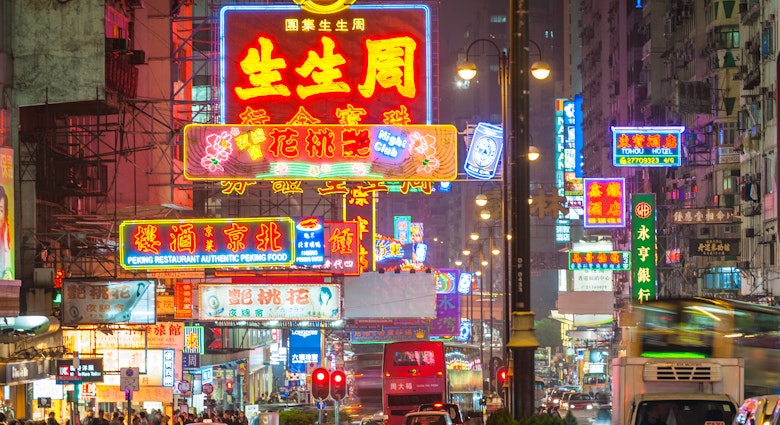 Neon-lit Nathan Road: the bustling heart of Kowloon. Image by fotoVoyager / Getty