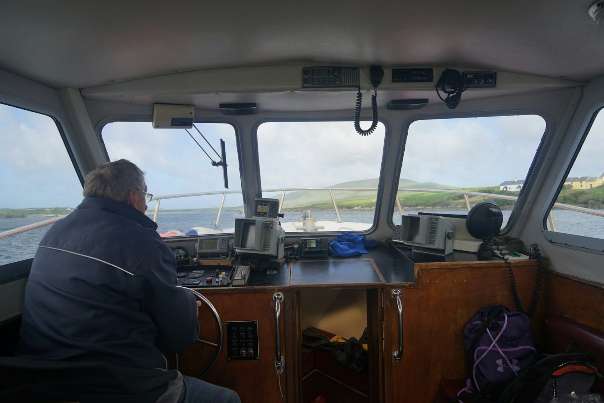Cockpit of boat heading from Portmagee to the Skelligs © James Kay / Lonely Planet
