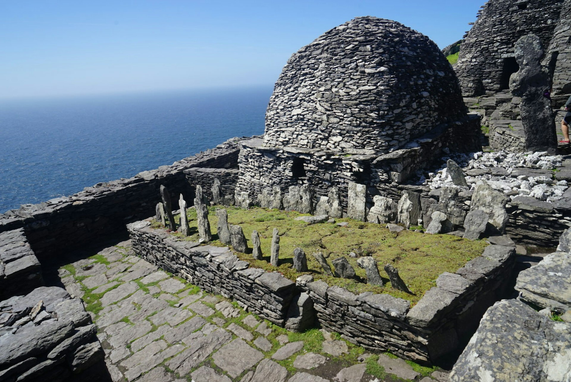 The ruins of a cemetery and beehive-shaped cells atop Skellig Michael © James Kay / Lonely Planet